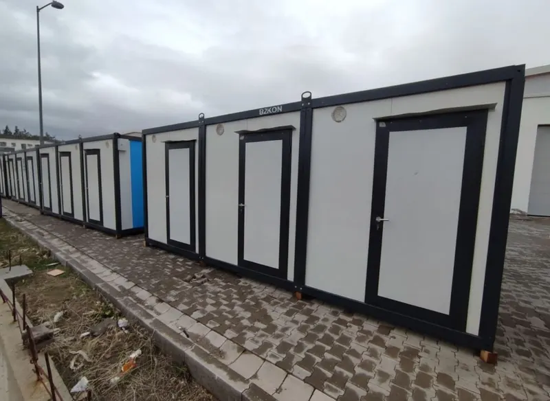 A row of B2KON storage cabins at a self-storage site