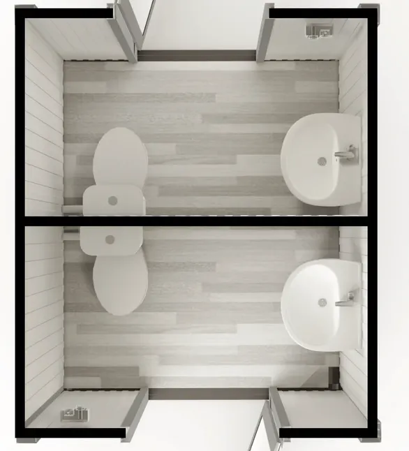 Top view of the layout: two separate restrooms, each with a toilet and sink