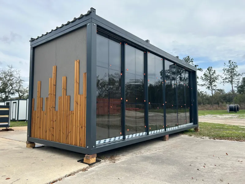 SOLID Elegant City Cabin with a sliding glass front and Thermowood accent slats
